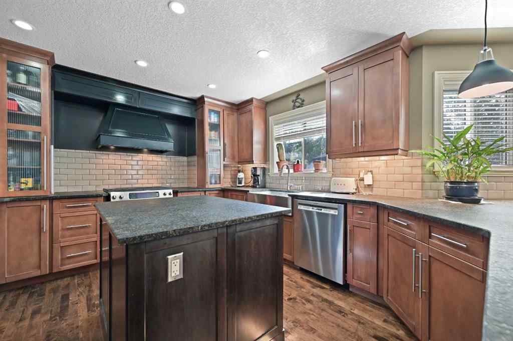 MLS® A2267148 - 41 Strathridge Crescent SW in Strathcona Park Calgary, Residential