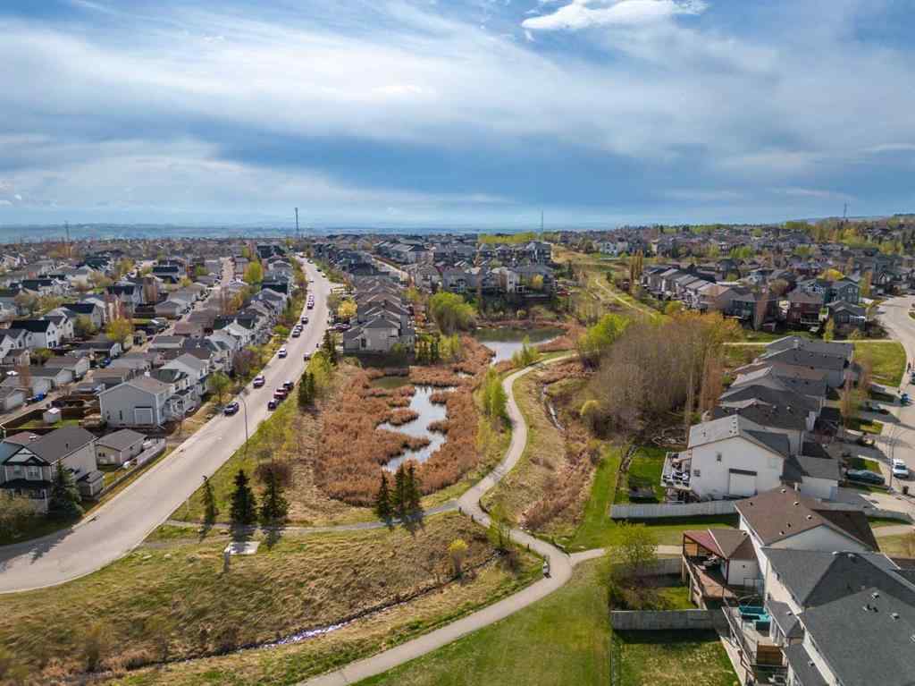 MLS® A2267152 - 141 Tuscany Valley Green  in Tuscany Calgary, Residential