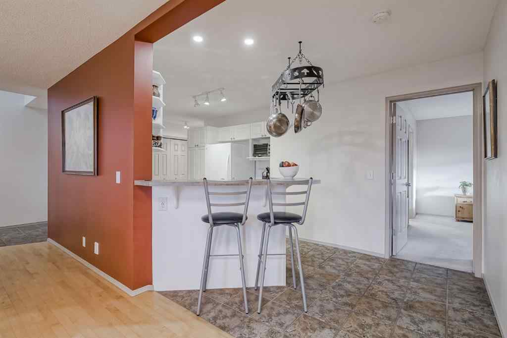 MLS® A2267172 - Unit #104 39 Hidden Creek Place NW in Hidden Valley Calgary, Residential