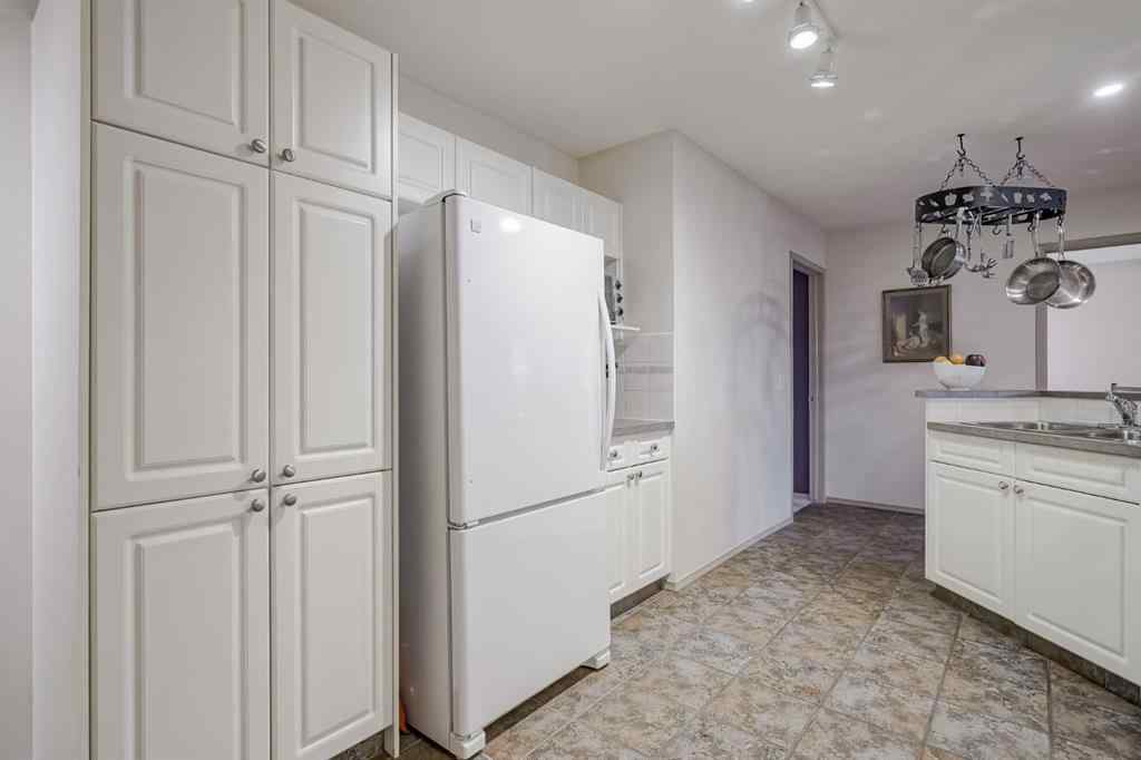 MLS® A2267172 - Unit #104 39 Hidden Creek Place NW in Hidden Valley Calgary, Residential