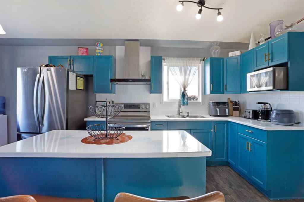 MLS® A2267177 - 216 14 Street E in Meadowbrook Brooks, Residential