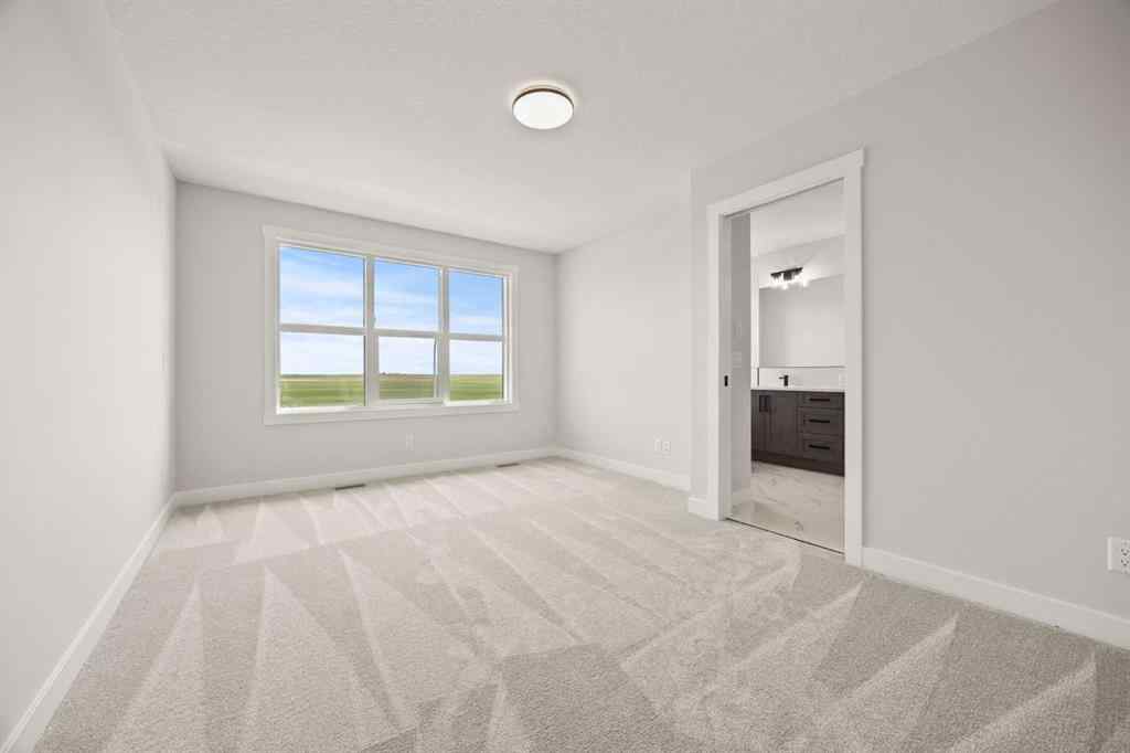 MLS® A2267199 - 494 Kinniburgh Loop  in Kinniburgh South Chestermere, Residential