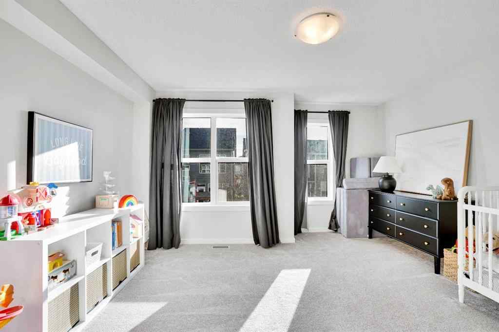 MLS® A2267202 - 128 Cranbrook Square SE in Cranston Calgary, Residential