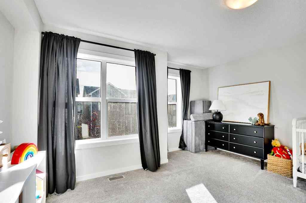 MLS® A2267202 - 128 Cranbrook Square SE in Cranston Calgary, Residential