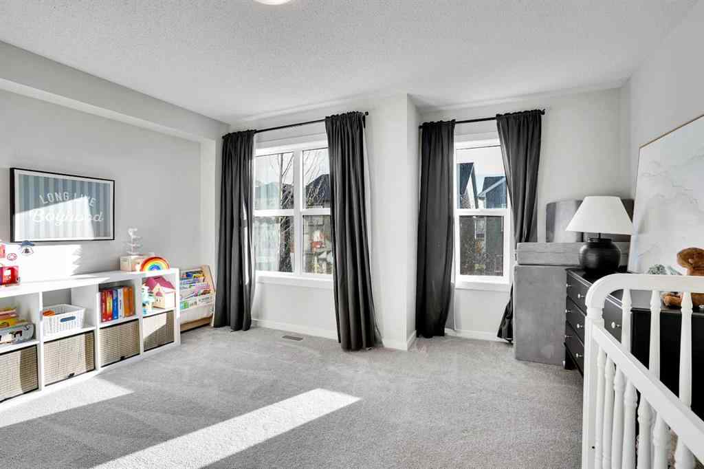 MLS® A2267202 - 128 Cranbrook Square SE in Cranston Calgary, Residential