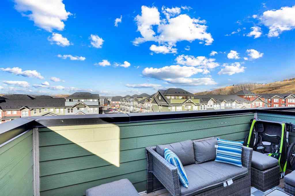 MLS® A2267202 - 128 Cranbrook Square SE in Cranston Calgary, Residential