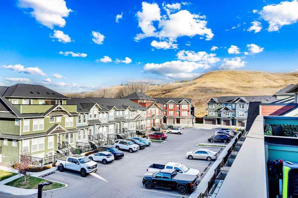 MLS® A2267202 - 128 Cranbrook Square SE in Cranston Calgary, Residential