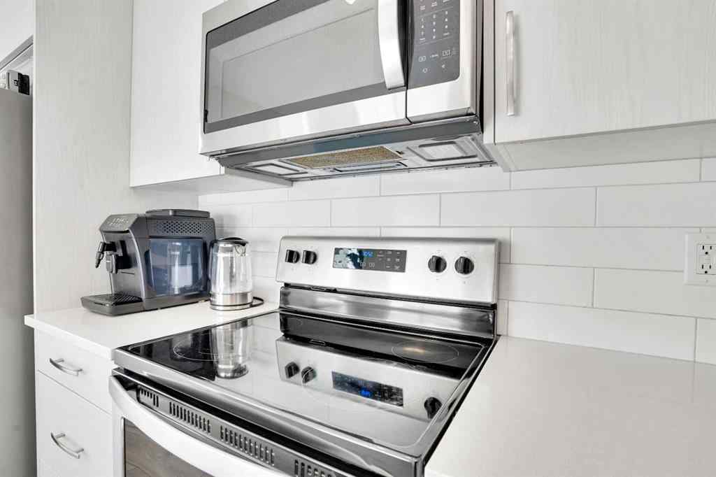 MLS® A2267202 - 128 Cranbrook Square SE in Cranston Calgary, Residential