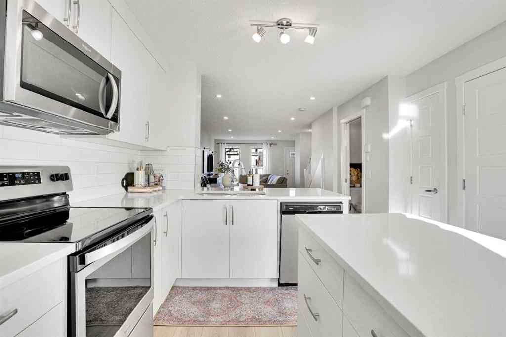 MLS® A2267202 - 128 Cranbrook Square SE in Cranston Calgary, Residential