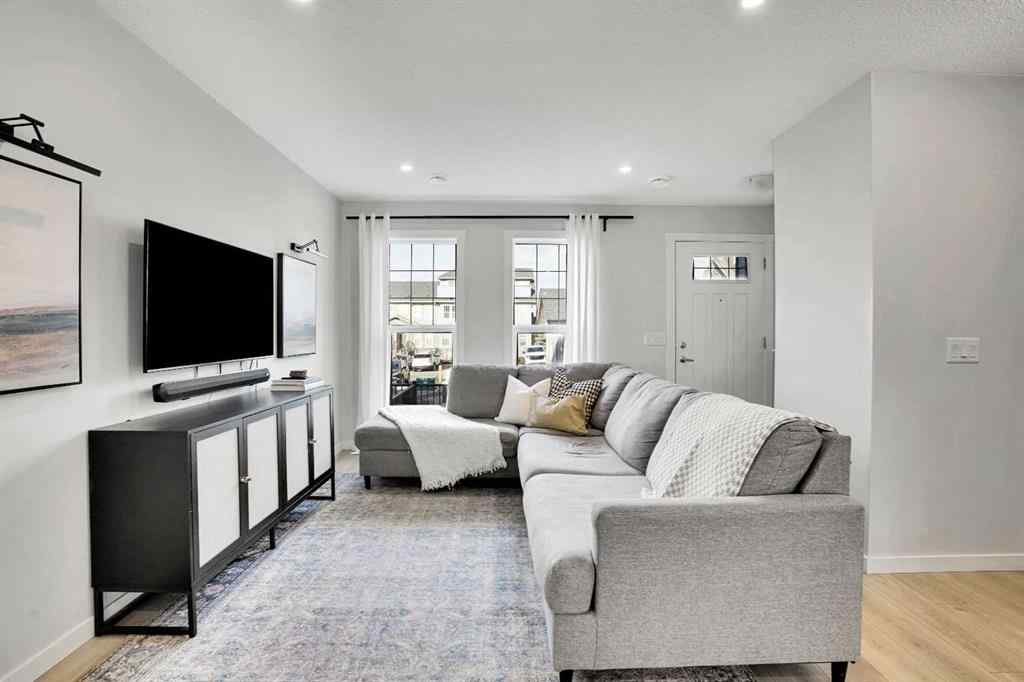 MLS® A2267202 - 128 Cranbrook Square SE in Cranston Calgary, Residential