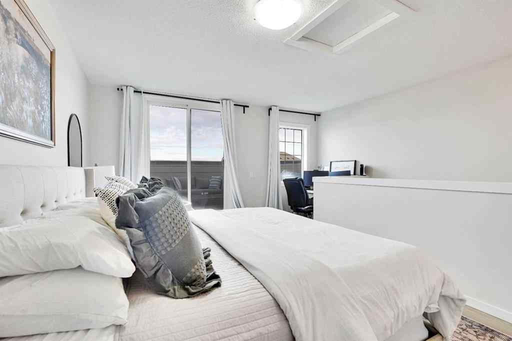 MLS® A2267202 - 128 Cranbrook Square SE in Cranston Calgary, Residential