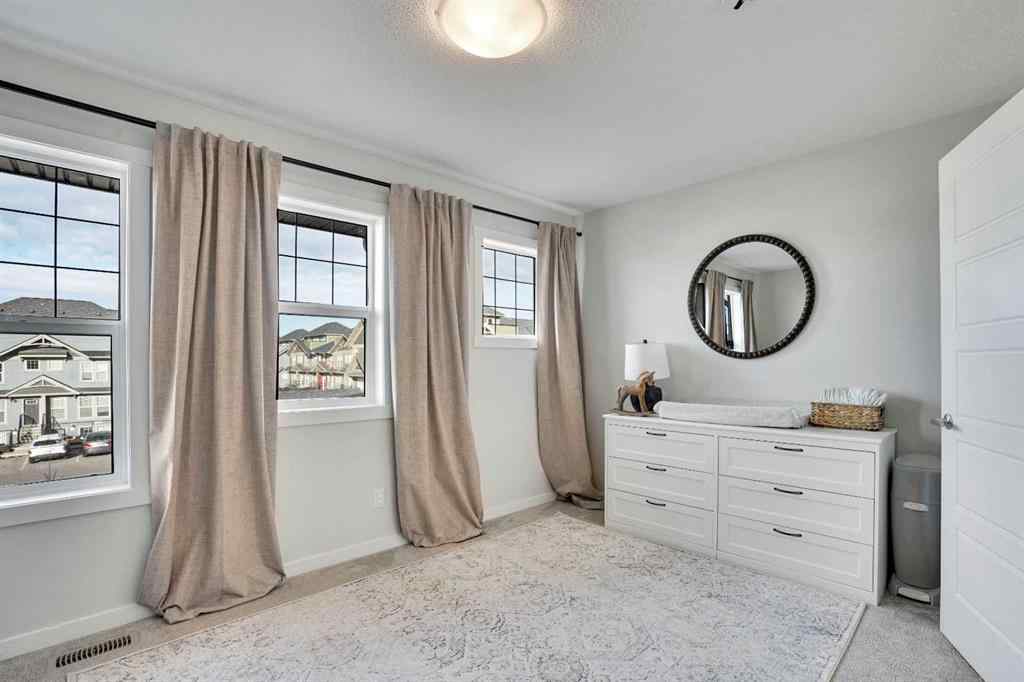 MLS® A2267202 - 128 Cranbrook Square SE in Cranston Calgary, Residential