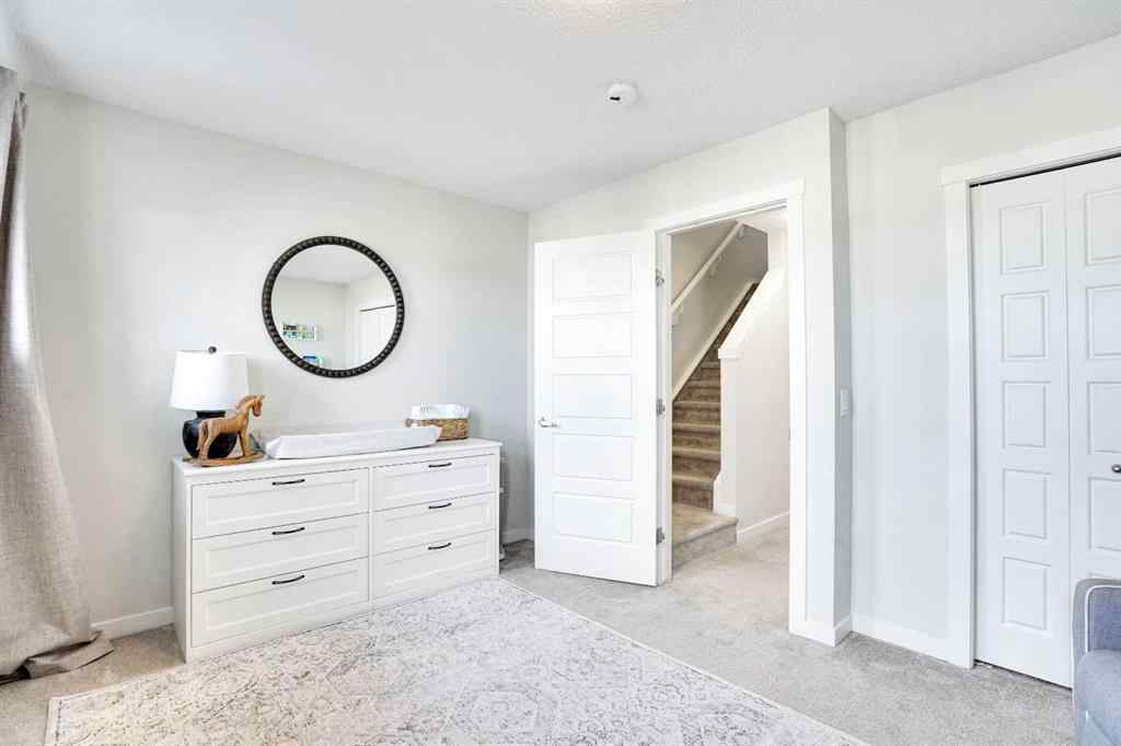 MLS® A2267202 - 128 Cranbrook Square SE in Cranston Calgary, Residential