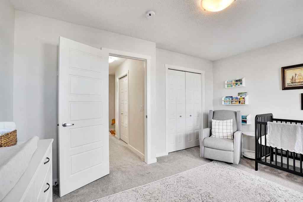 MLS® A2267202 - 128 Cranbrook Square SE in Cranston Calgary, Residential