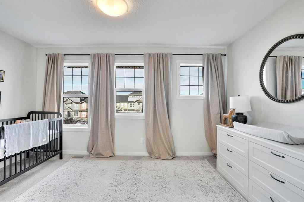 MLS® A2267202 - 128 Cranbrook Square SE in Cranston Calgary, Residential