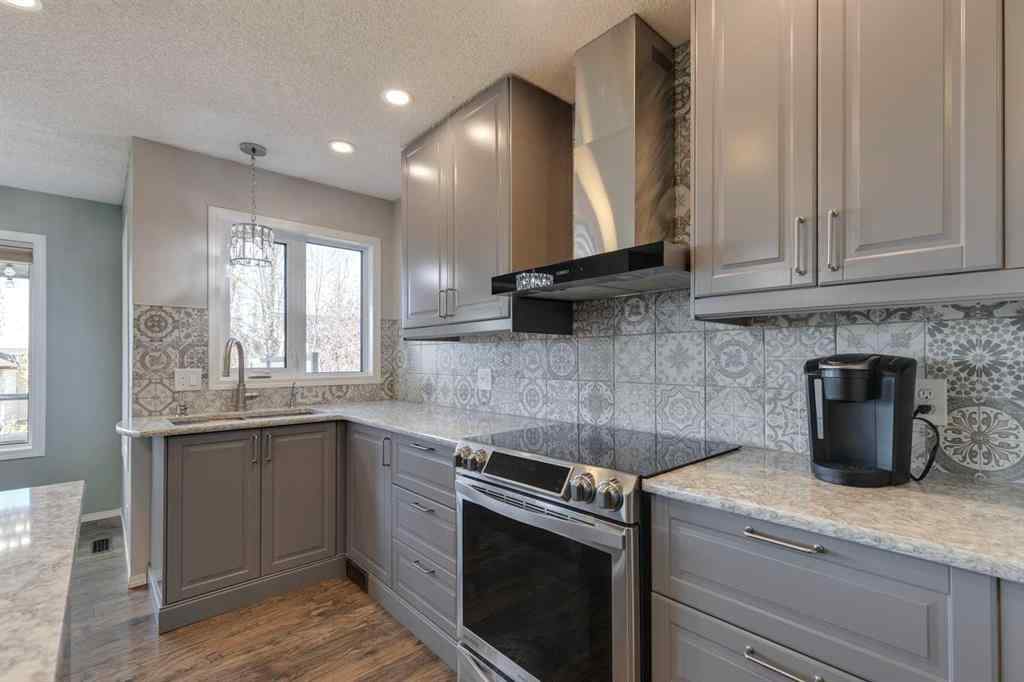 MLS® A2267211 - 244 Tuscany Ridge View NW in Tuscany Calgary, Residential