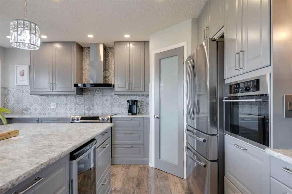 MLS® A2267211 - 244 Tuscany Ridge View NW in Tuscany Calgary, Residential