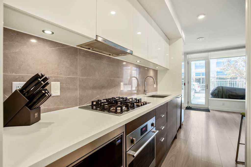 MLS® A2267231 - Unit #103 108 Waterfront Court SW in Chinatown Calgary, Residential