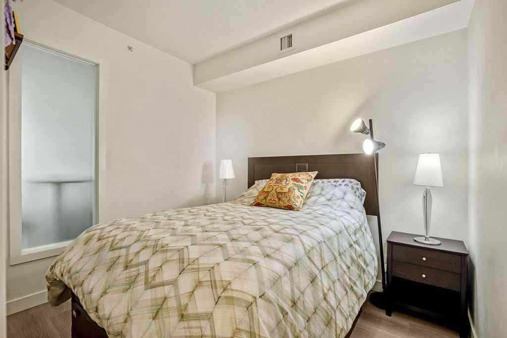 MLS® A2267231 - Unit #103 108 Waterfront Court SW in Chinatown Calgary, Residential