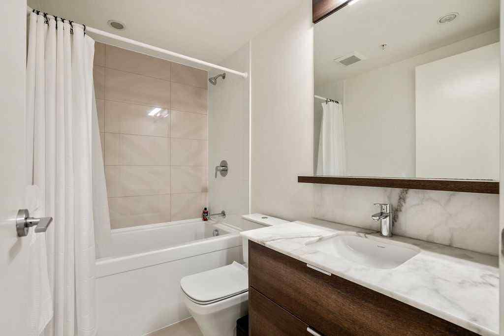 MLS® A2267231 - Unit #103 108 Waterfront Court SW in Chinatown Calgary, Residential