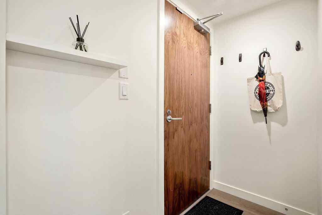 MLS® A2267231 - Unit #103 108 Waterfront Court SW in Chinatown Calgary, Residential