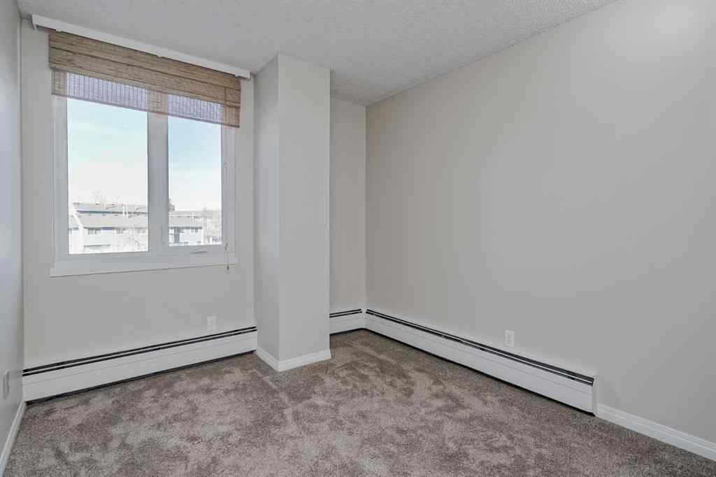 MLS® A2267249 - Unit #307 4944 Dalton Drive NW in Dalhousie Calgary, Residential