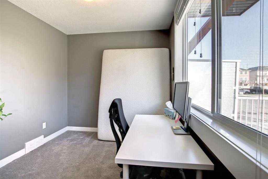 MLS® A2267258 - Unit #11 111 Rainbow Falls Gate  in Rainbow Falls Chestermere, Residential