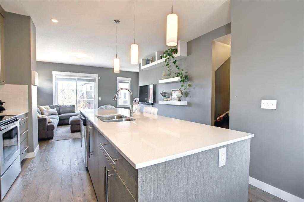 MLS® A2267258 - Unit #11 111 Rainbow Falls Gate  in Rainbow Falls Chestermere, Residential