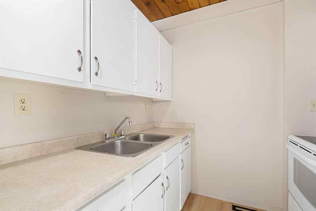 MLS® A2267269 - Unit #201 11010 Bonaventure Drive SE in Willow Park Calgary, Residential