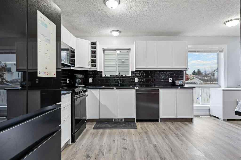 MLS® A2267271 - 30 River Rock Way SE in Riverbend Calgary, Residential