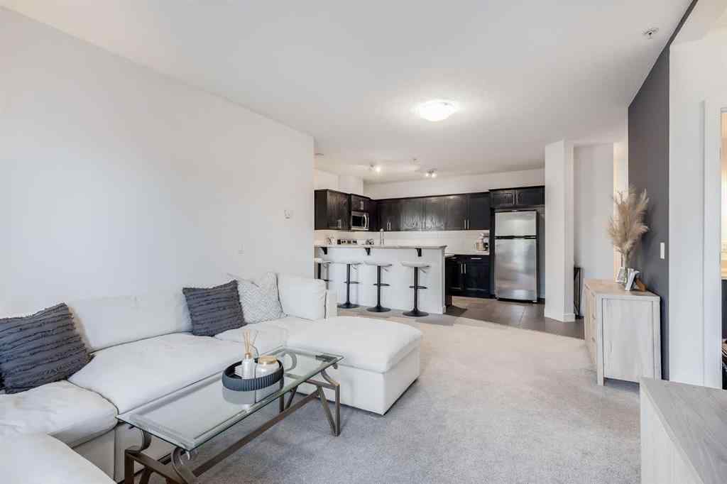 MLS® A2267280 - Unit #204 117 19 Avenue NE in Tuxedo Park Calgary, Residential