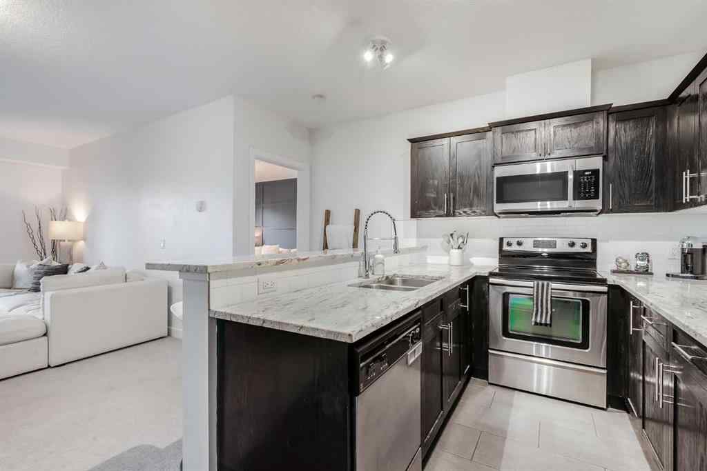 MLS® A2267280 - Unit #204 117 19 Avenue NE in Tuxedo Park Calgary, Residential