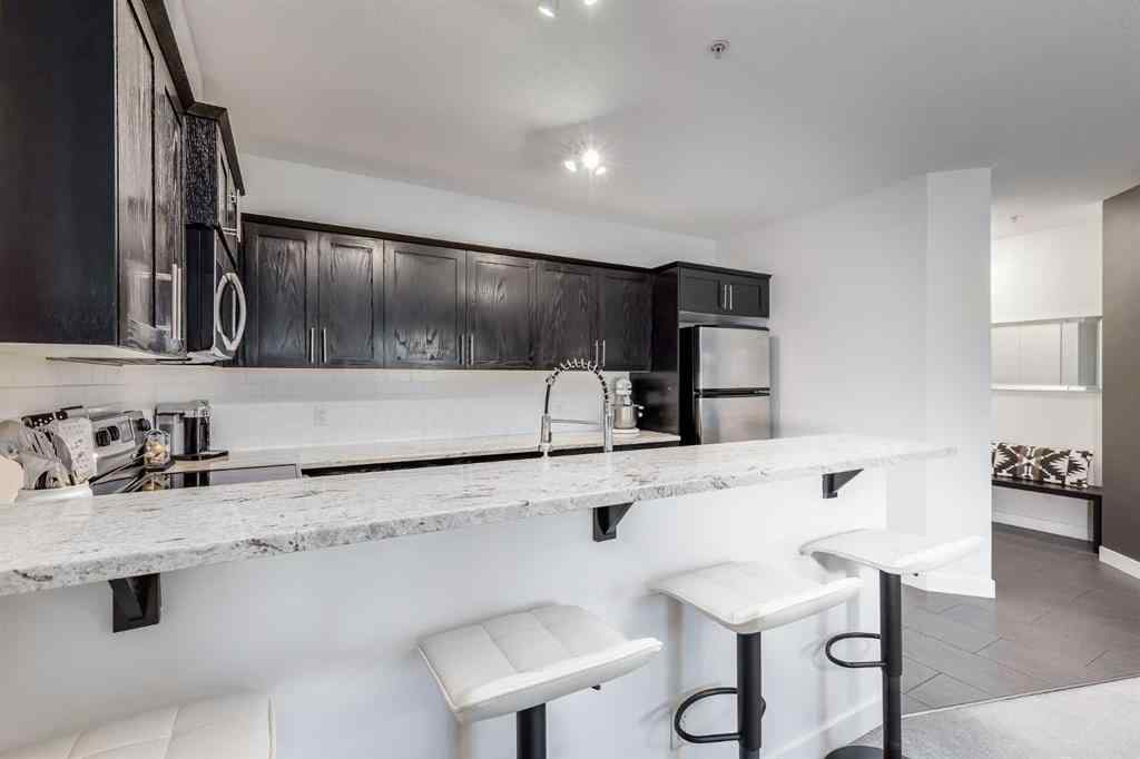 MLS® A2267280 - Unit #204 117 19 Avenue NE in Tuxedo Park Calgary, Residential