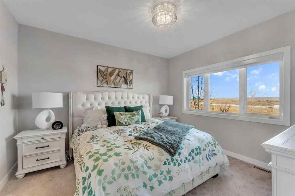 MLS® A2267304 - 406 Crestridge Common SW in Crestmont Calgary, Residential