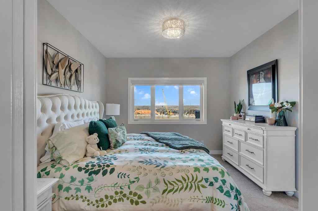 MLS® A2267304 - 406 Crestridge Common SW in Crestmont Calgary, Residential