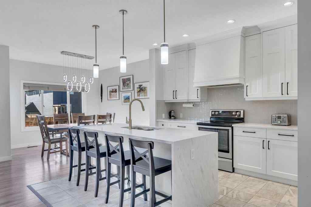 MLS® A2267306 - 1535 Ravensmoor Way SE in Ravenswood Airdrie, Residential