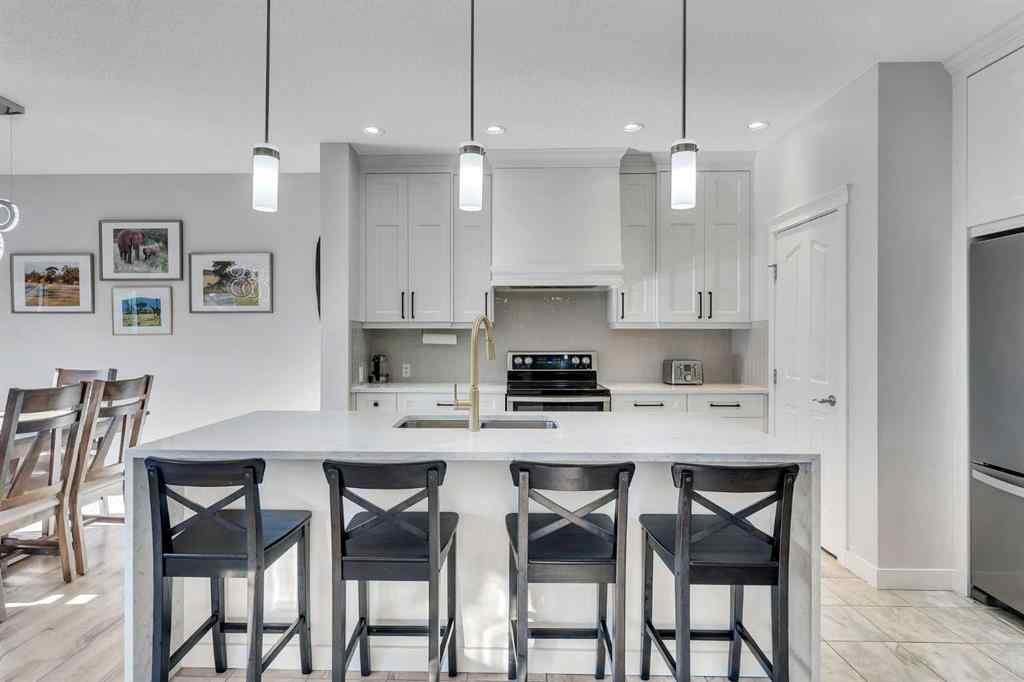 MLS® A2267306 - 1535 Ravensmoor Way SE in Ravenswood Airdrie, Residential