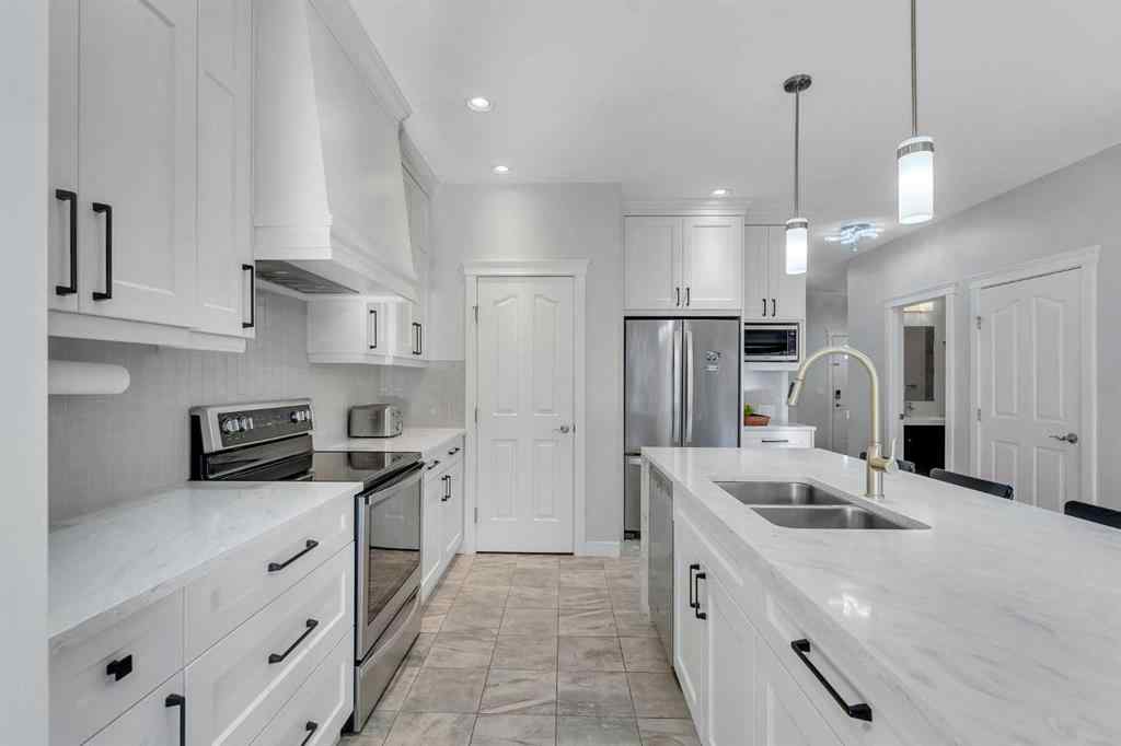 MLS® A2267306 - 1535 Ravensmoor Way SE in Ravenswood Airdrie, Residential