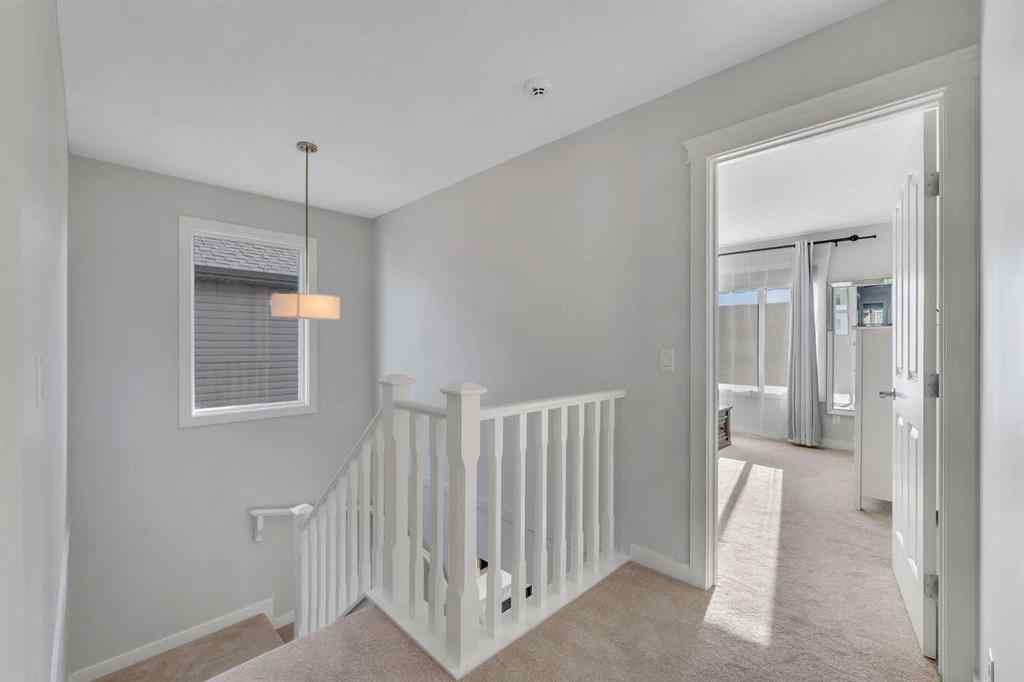 MLS® A2267306 - 1535 Ravensmoor Way SE in Ravenswood Airdrie, Residential