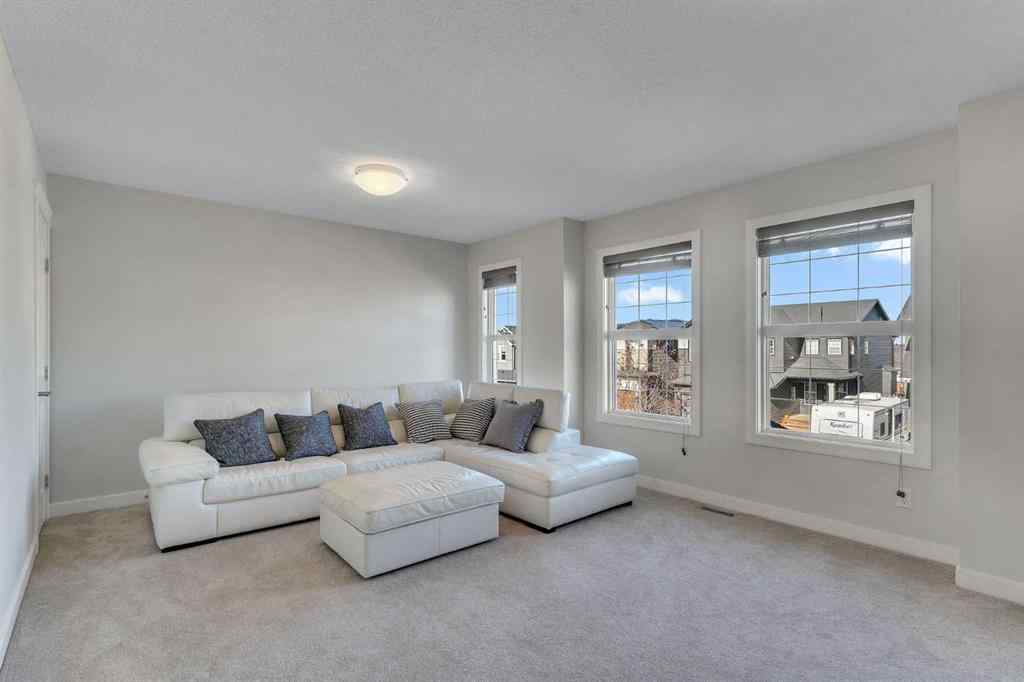 MLS® A2267306 - 1535 Ravensmoor Way SE in Ravenswood Airdrie, Residential