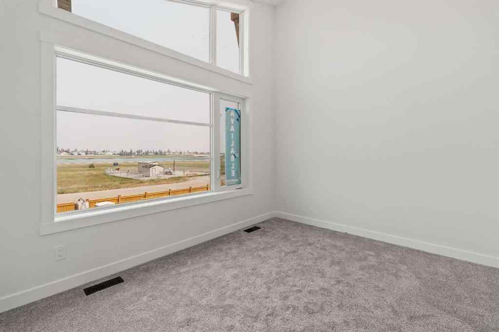 MLS® A2267309 - 275 Silver Spruce Grove SW in Silverado Calgary, Residential