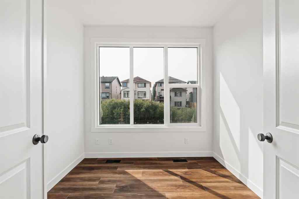 MLS® A2267309 - 275 Silver Spruce Grove SW in Silverado Calgary, Residential