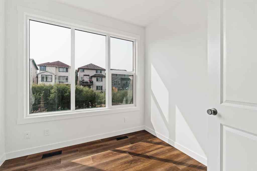 MLS® A2267309 - 275 Silver Spruce Grove SW in Silverado Calgary, Residential