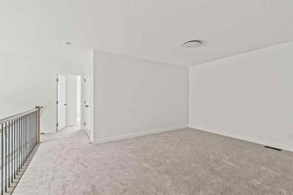 MLS® A2267309 - 275 Silver Spruce Grove SW in Silverado Calgary, Residential