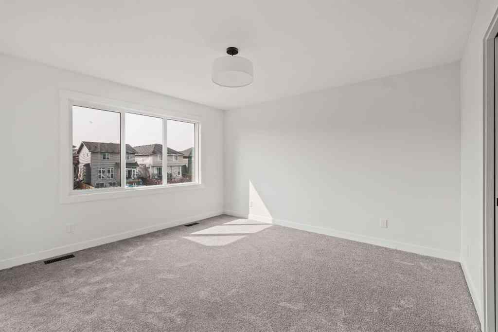 MLS® A2267309 - 275 Silver Spruce Grove SW in Silverado Calgary, Residential