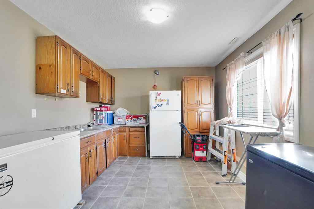 MLS® A2267313 - 1065 Channelside Drive SW in Canals Airdrie, Residential
