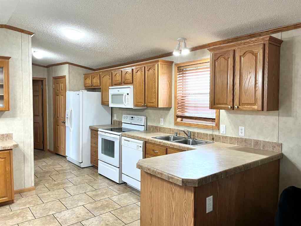 MLS® A2267315 - Unit #64 9824 104 Avenue  in N/A Clairmont, Mobile