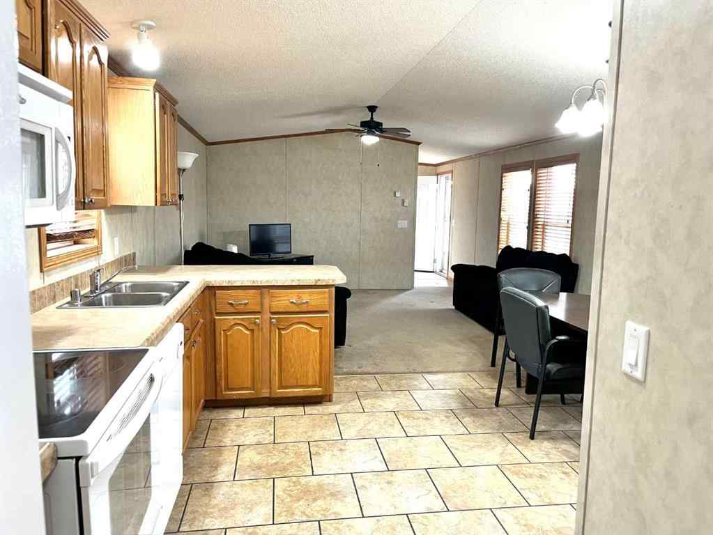 MLS® A2267315 - Unit #64 9824 104 Avenue  in N/A Clairmont, Mobile