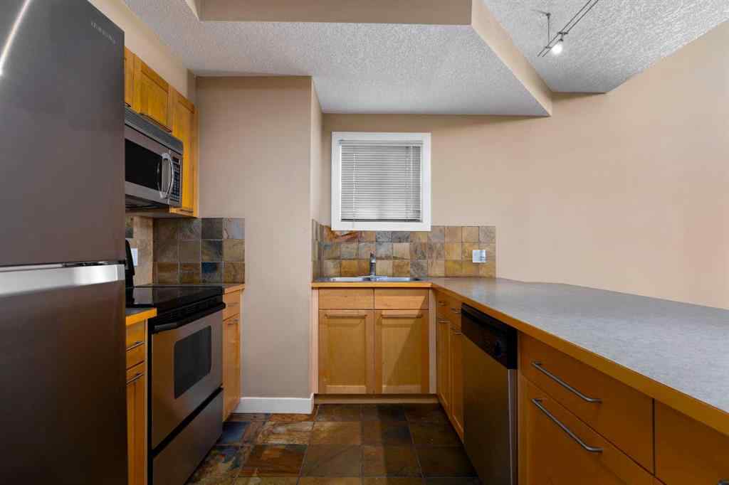 MLS® A2267323 - Unit #101 1505 27 Avenue SW in South Calgary Calgary, Residential
