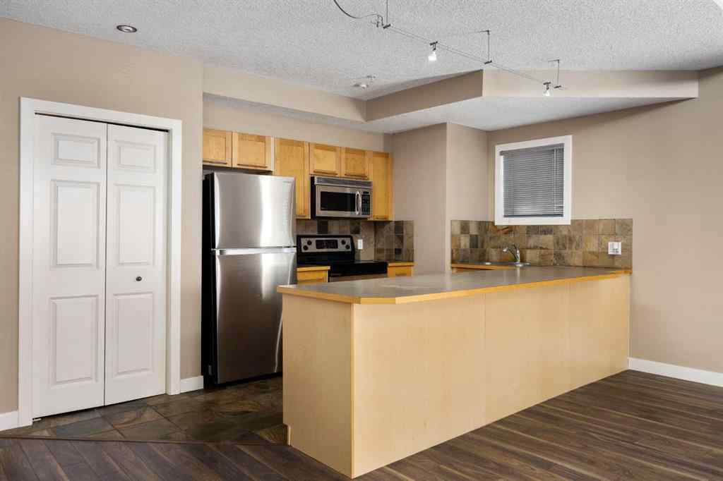 MLS® A2267323 - Unit #101 1505 27 Avenue SW in South Calgary Calgary, Residential